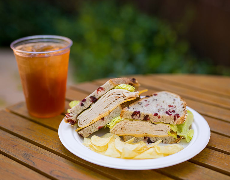 sandwich, chips and a drink